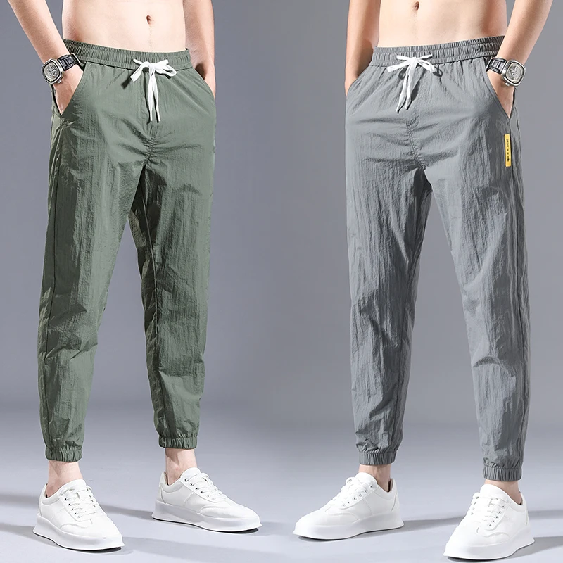 New Summer Thin Wrinkled Fabric Loose Tapered Harem Pants Men Quick-Dry Elastic Cuff Elastic Waist Casual Trousers Male City Boy
