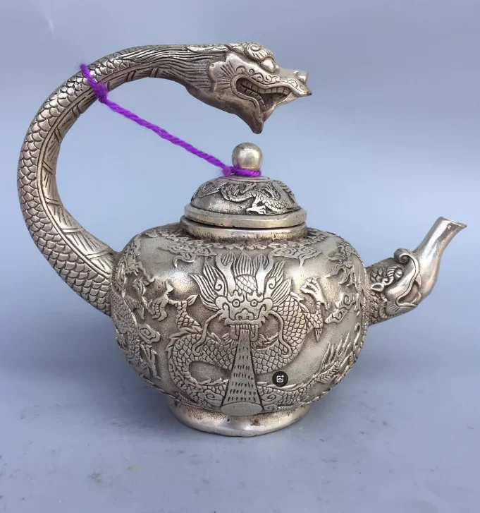 

Коллекционный китайский тибетский серебряный чайник с ручной резьбой в виде дракона