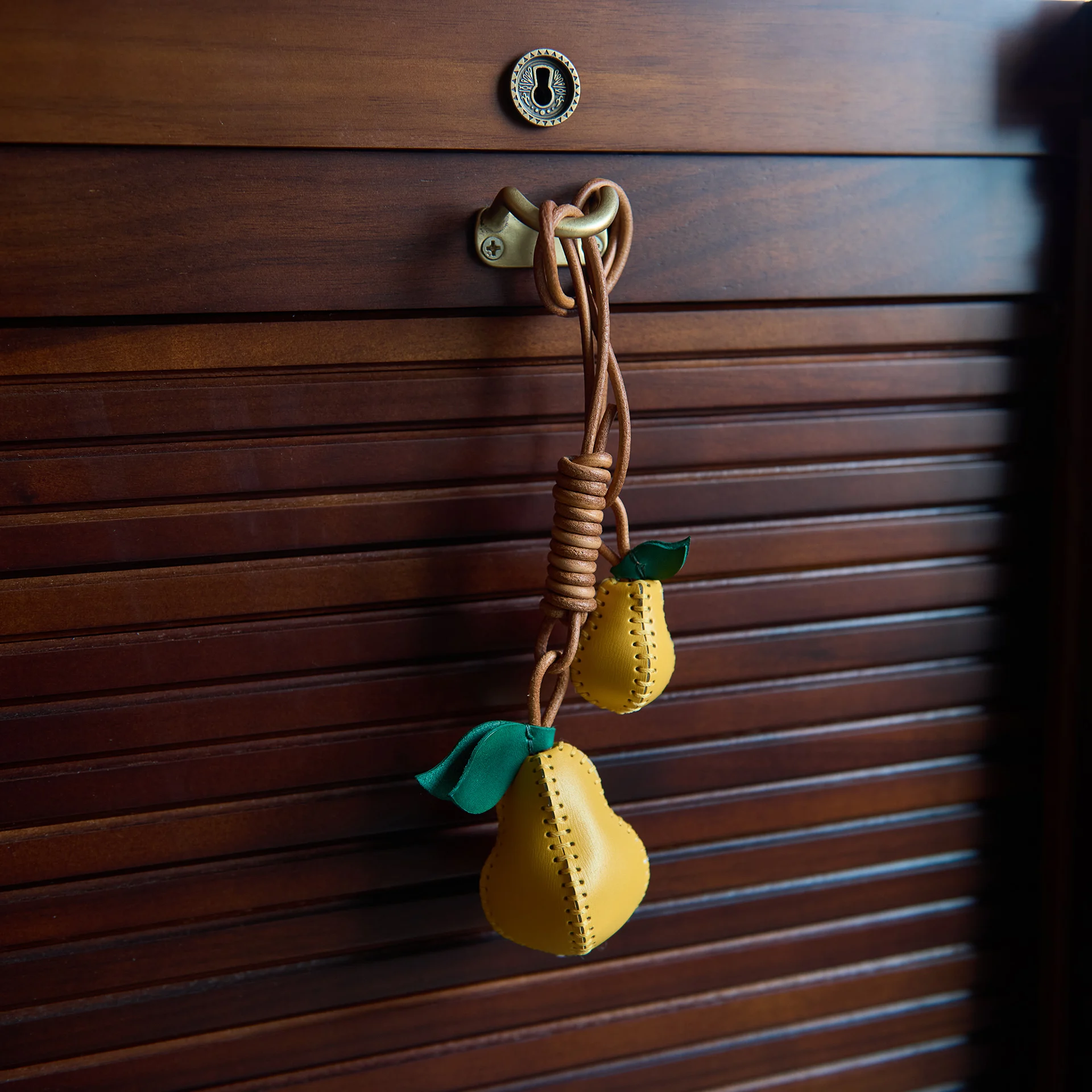 handmade-leather-pear-bag-charm-embroidered-sheepskin-3d-stitched-cotton-core-filled-fashionable-bag-accessories-from-china