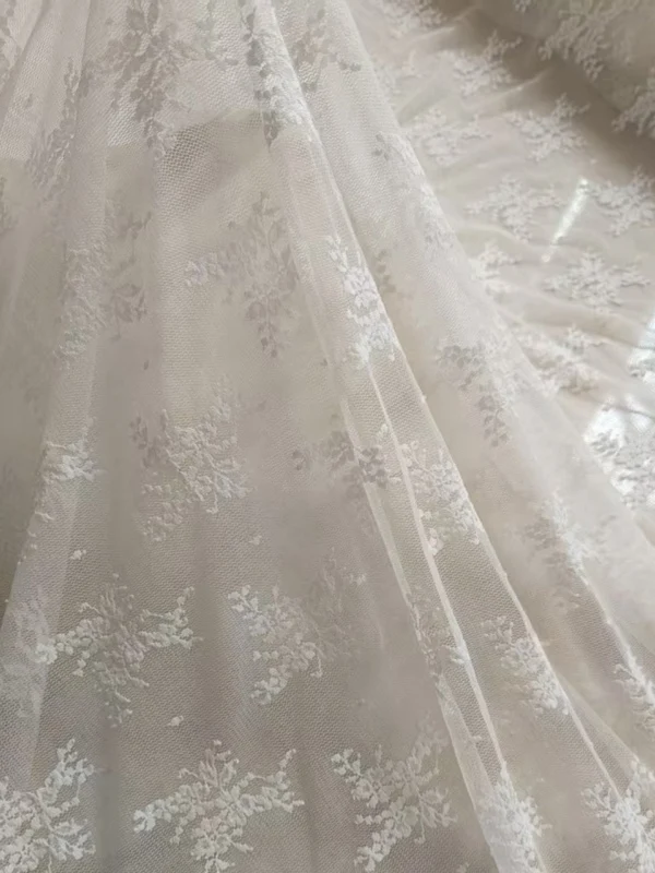 

Handmade Elastic Floral Lace Net Fabric in Creamy Camel Color for Home Textiles And Crafts Lightweight Material for Blinds