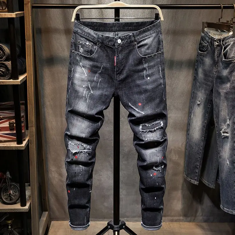 Harajuku celana Jeans Hip-Hop pria, baju gaya Korea Mewah Trendi Slim Fit ramping dengan lubang dan tambalan hitam bergaya Korea 2023