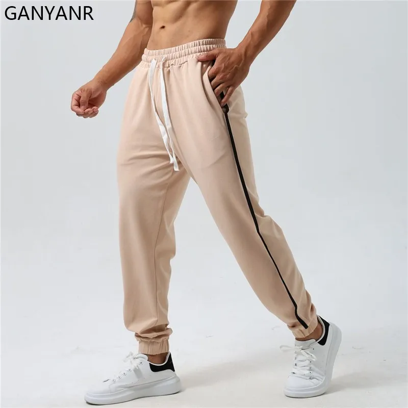 GANYANR Running Pants Men Leggings Pockets gym Sports basketball Sweatpants fitness trousers Sportswear Training Jogger workout