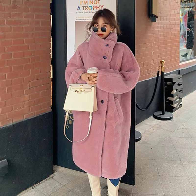 

The new casual plush coat for women a mixed fur with long stand-up collar exudes stylish and elegant vibe