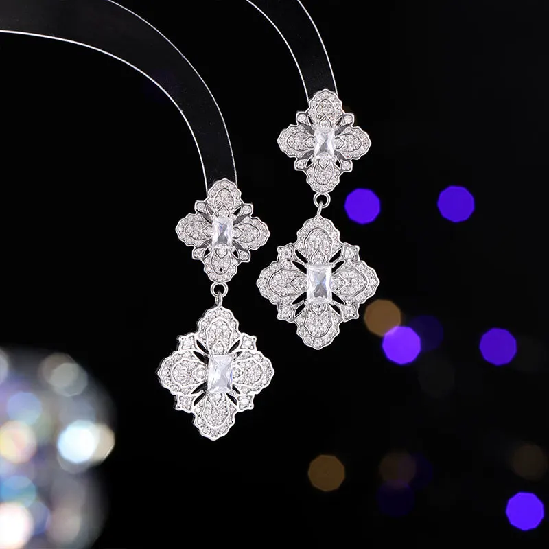 

Micro-inlaid zircon earrings, fashionable four-leaf flower exquisite long 925 silver needle simple flower earrings and pendants