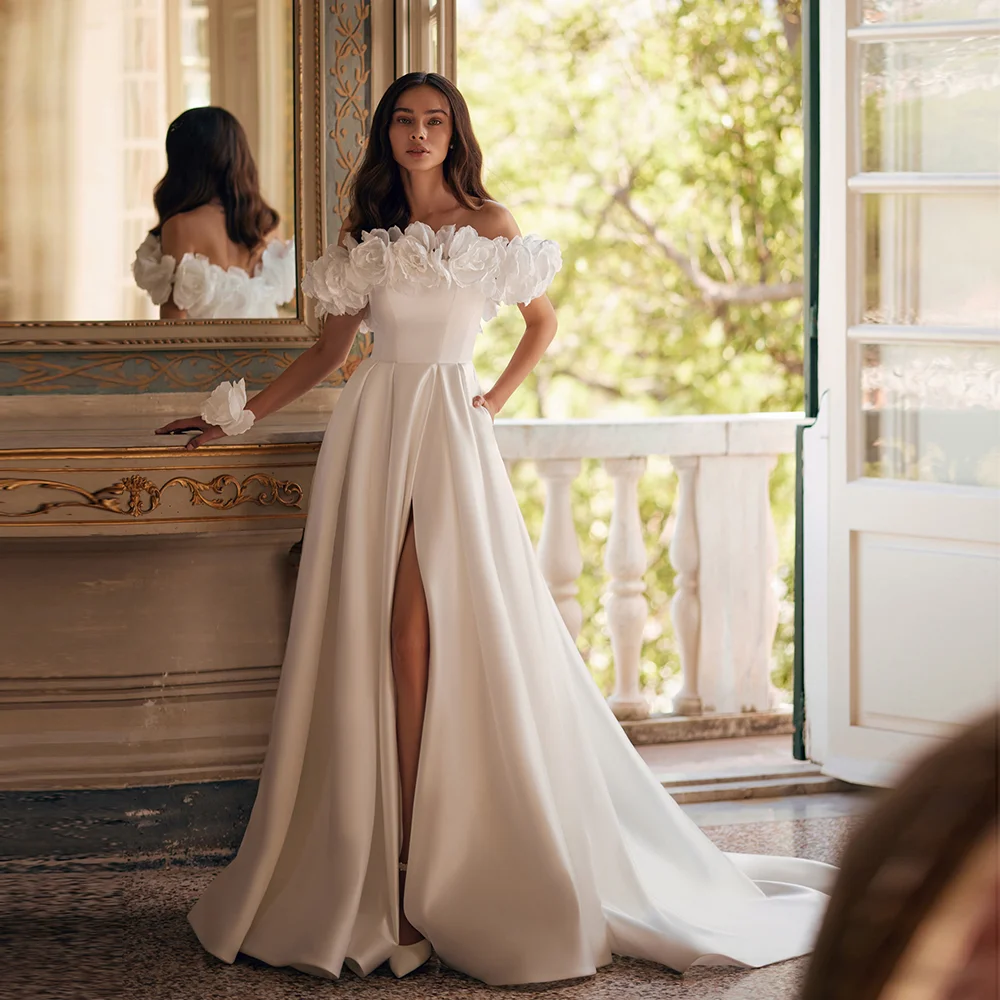 

Атласное платье трапециевидной формы с воротником-лодочкой и цветами на заказ, свадебное платье трапециевидной формы с открытой спиной и боковым разрезом, свадебное платье Trian с карманами