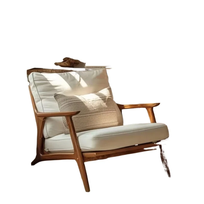 

Modern solid wood armchair with white cushions, available directly from the coffee shop