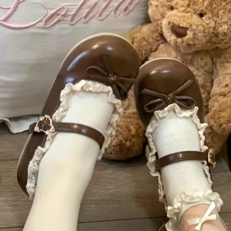 القوس عقدة الأحذية الكورية لينة جولة تو الأحذية النسائية فراشة 2025 فستان ممرضة مريحة شقة فراشة عقدة الأزهار أحذية Wom