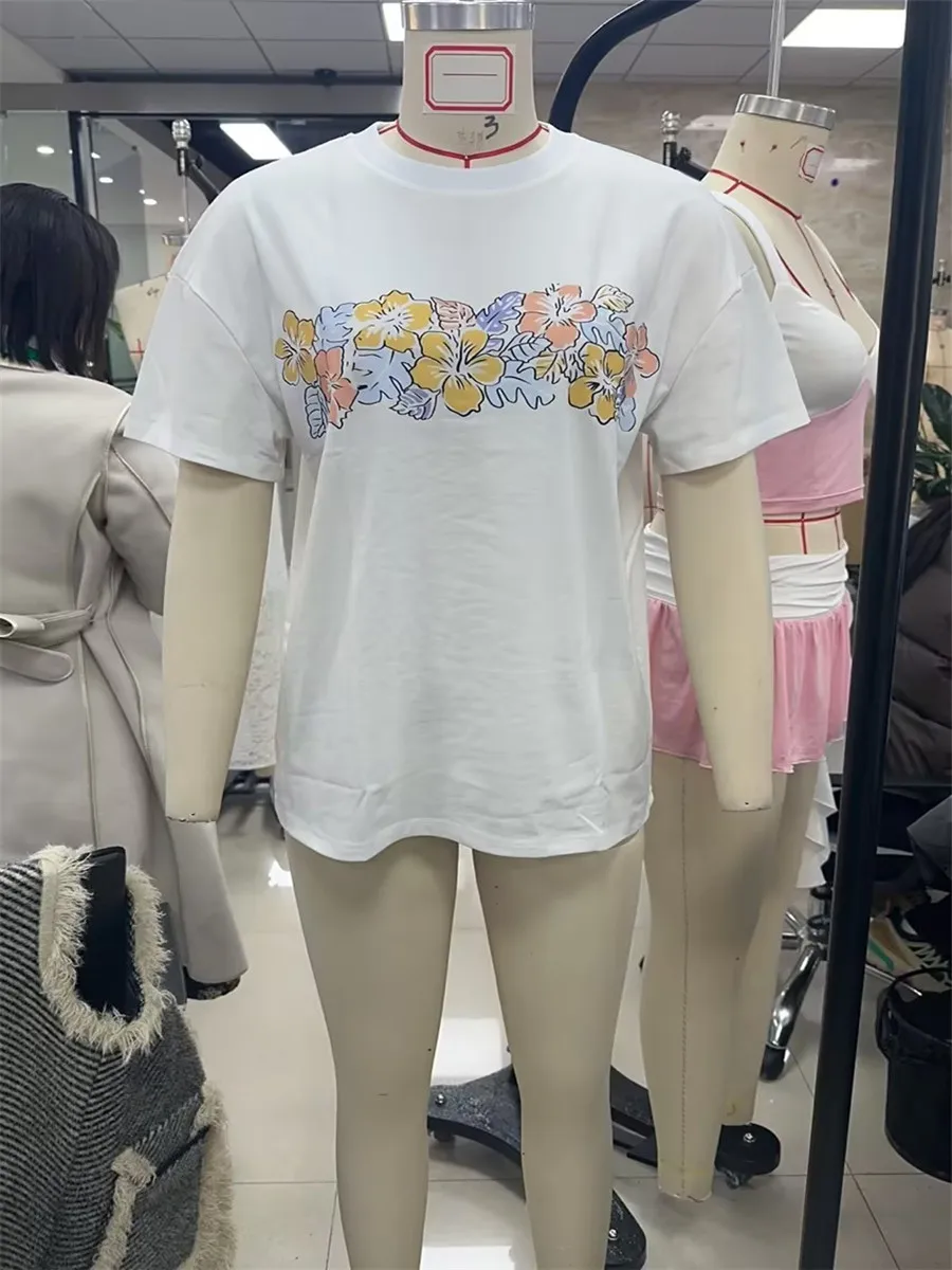 女性のカジュアルなクルーネックTシャツ,花柄の半袖Tシャツ,ゆったりとしたビーチウェア,毎日のストリートウェア,夏