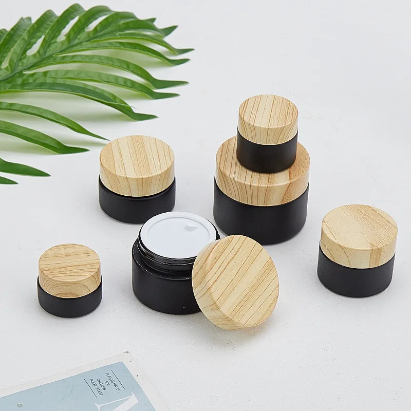 200pcs 1oz 2 oz 4 oz Cosmetic Black Frosted Glass Eye Cream Container Skincare Face Cream Jar with Bamboo Lid