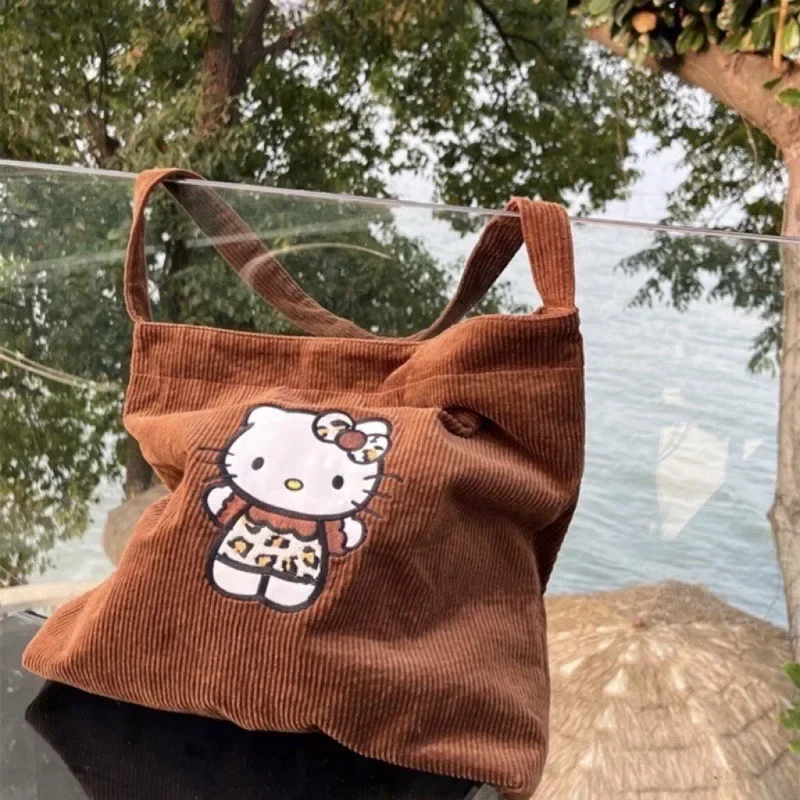 Sanrio Hello Kitty sztruksowe torby Crossbody dla kobiet o dużej pojemności torba na ramię moda kreskówka słodkie dziewczyny studenckie torebka na