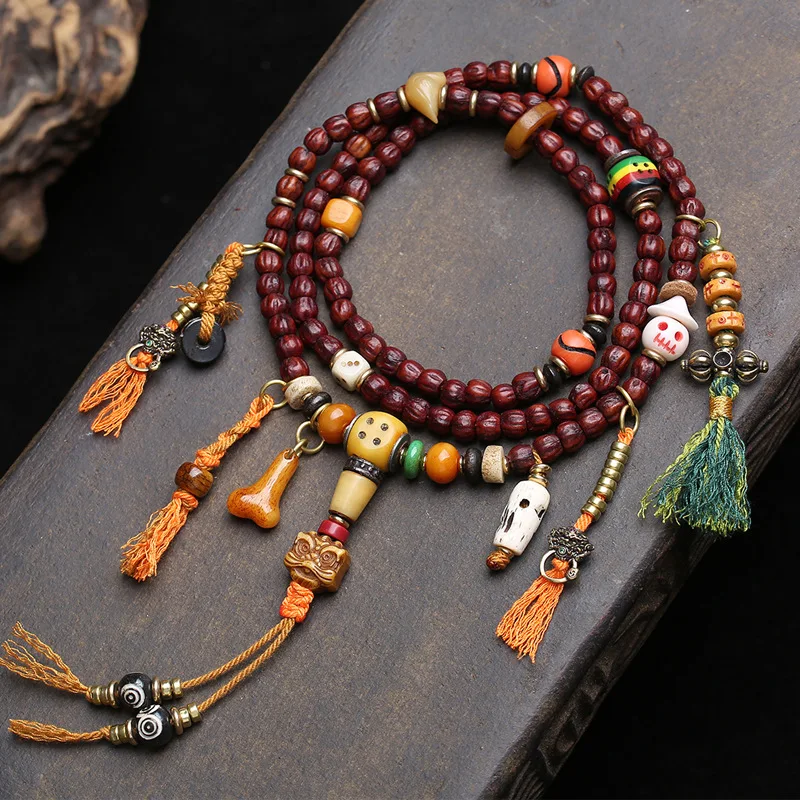 

Tibetan-style collectible straight-cut passion fruit seed bodhi 108-bead rosary with backflow bone dice