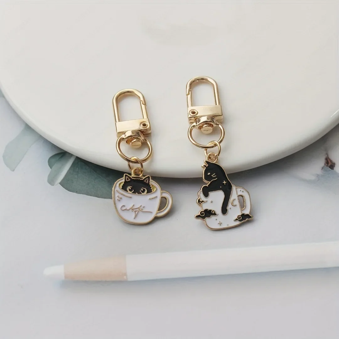 Drip oil alloy teacup cat keychain cup chain pendant earphone pendant small gift (send one randomly)