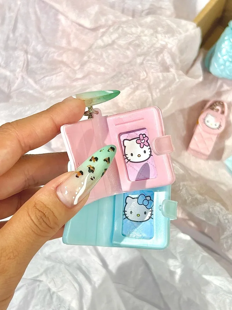 

New Prod Kitty Angel Series Blind Box Kawaii Cartoon Animation Simulation Phone Bag Mini Makeup Bag Pendant Phone Chain