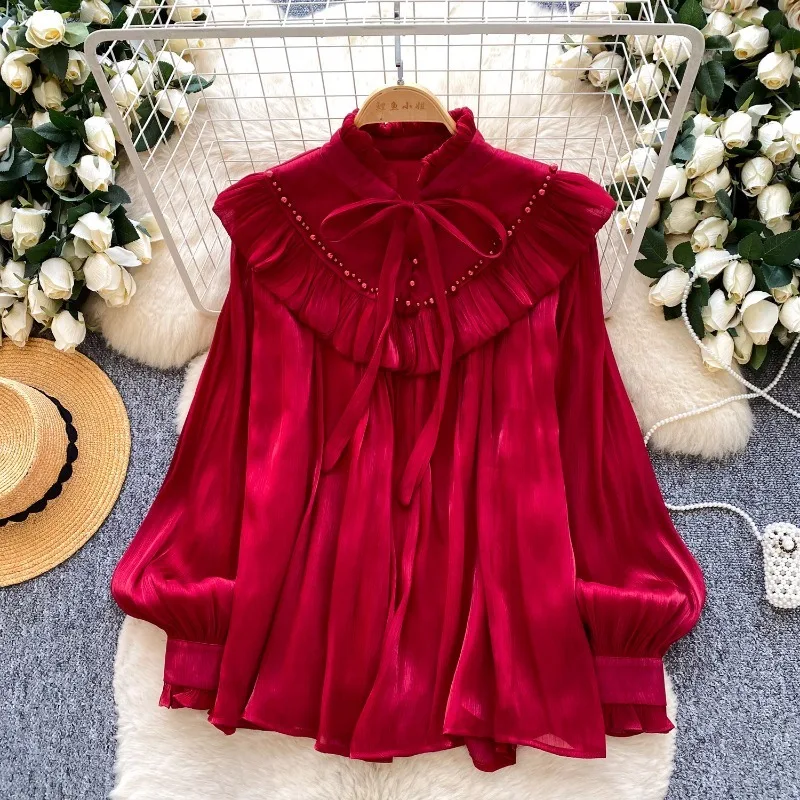 

Нежная женская блузка в винтажном французском стиле с бантом, воротником-стойкой, свободного кроя, с кружевными оборками и драпировкой, в корейском стиле.