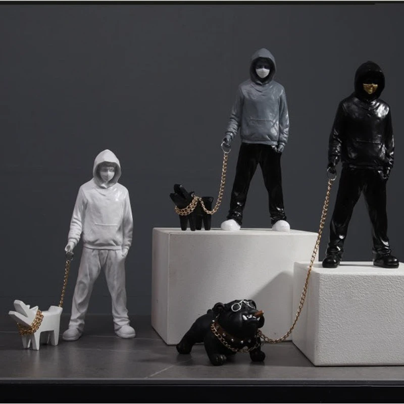 Creative Banksy Is A Fashionable Man Who Plays with Dogs, White Fashionable Toys, Art Sculptures