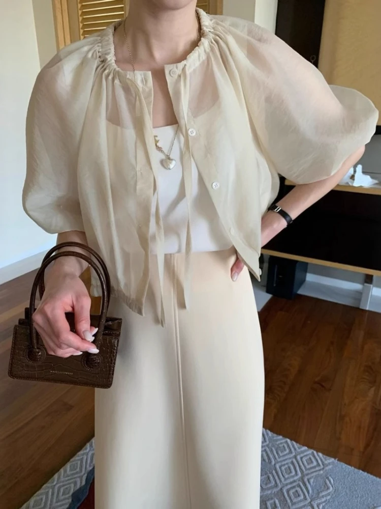

Korobov Korean Chic Summer Short Sleeve Solid Loose Puff Sleeve Lace-Up Single Breasted Thin Wrap Coat
