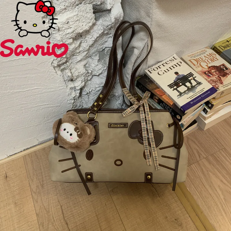 

Hello Kitty 2026 New Women's Handbag Fashion High Quality Girls Commuting Storage Bag Solid Color Versatile Girls Shoulder Bag