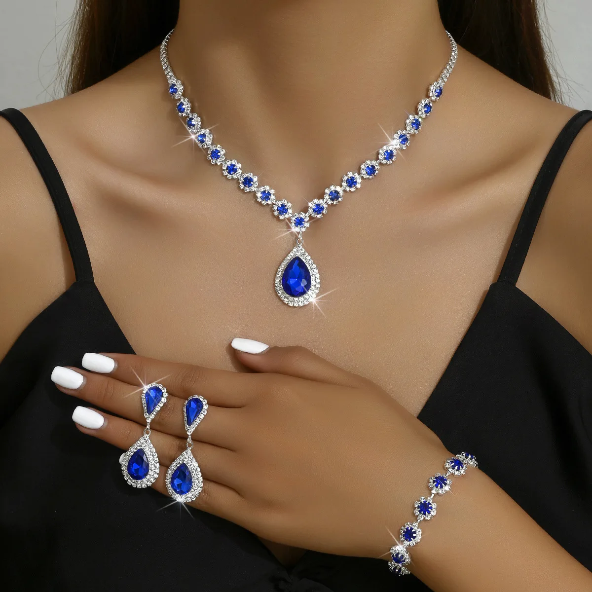 

4 pieces of women's crystal droplet Flower Necklace, Earrings, and Bracelet Jewelry set for wedding evening dress accessories