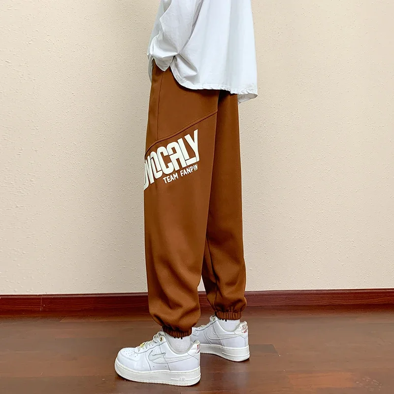 กางเกงขายาวทรงตรง น้ำหนักเบา ระบายอากาศดี สไตล์ลำลอง แฟชั่นใหม่ สำหรับผู้ชายและผู้หญิง เหมาะกับฤดูใบไม้ร่วง เอวยางยืด มีเชือกผูก