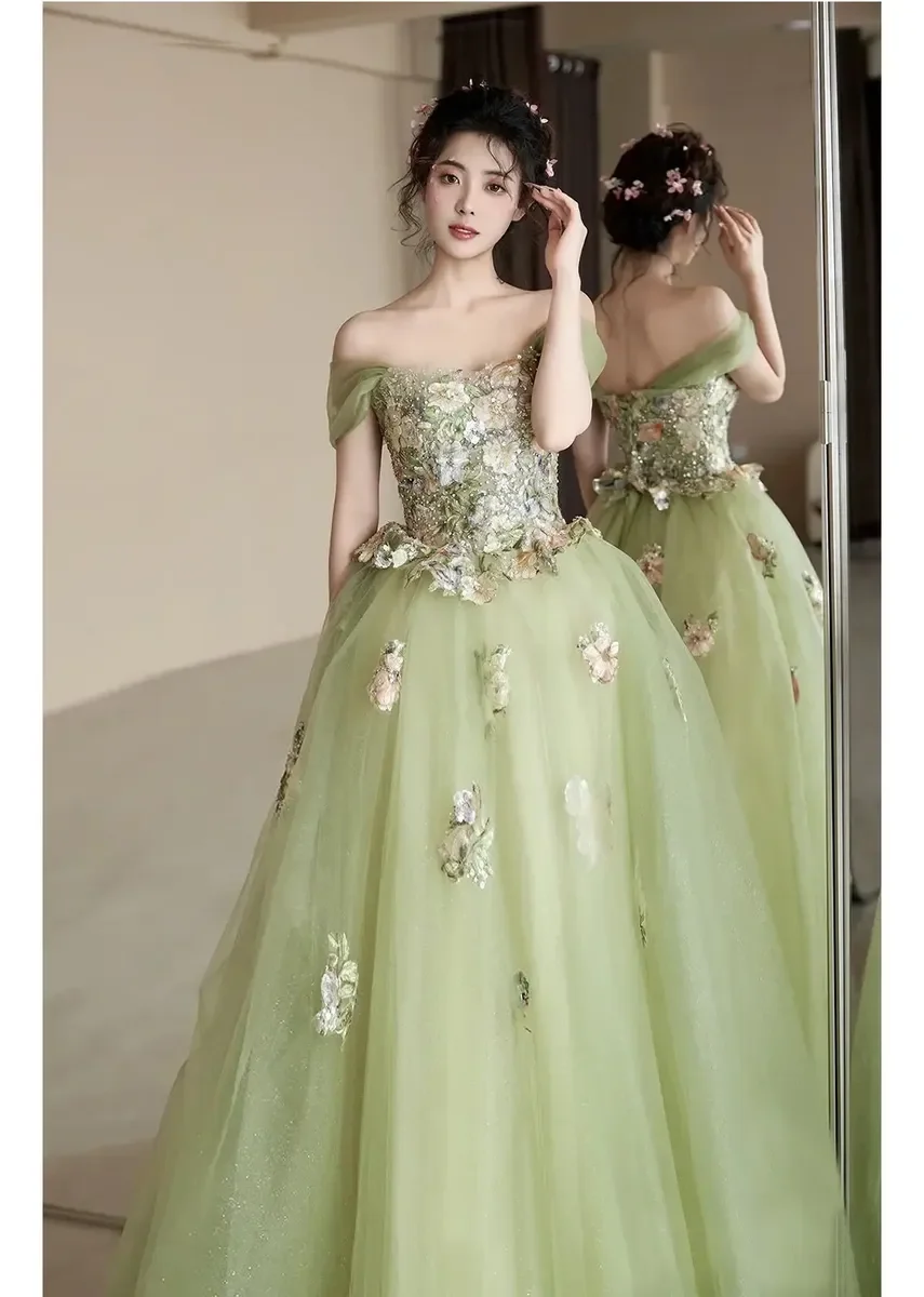 

Green Off‑Shoulder Tulle Ball Gown with 3D Floral Appliqué & Corset Back for Quinceanera, Prom, Formal Events, Evening Parties