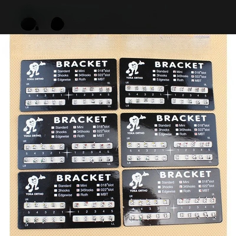 

Dental Orthodontic Brackets ROTHMBT Paper Mini Metal Mesh Bottom Straight Wire Arch Bracket Orthodontic Treatment Laboratory