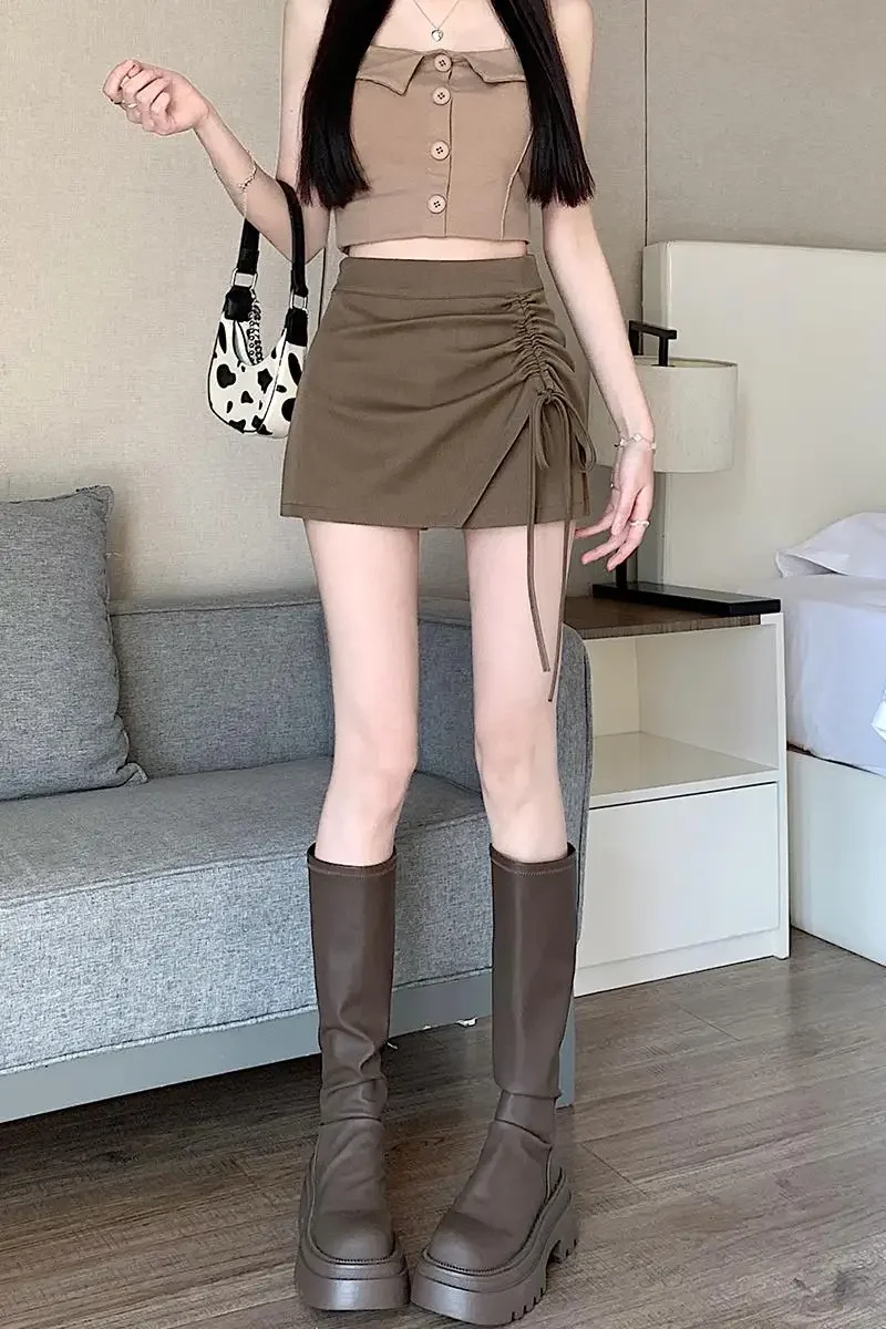 Primavera e verão drapeado cordão menina picante com figura ultracurta, shorts de cintura alta, saia de calças, saia evasê