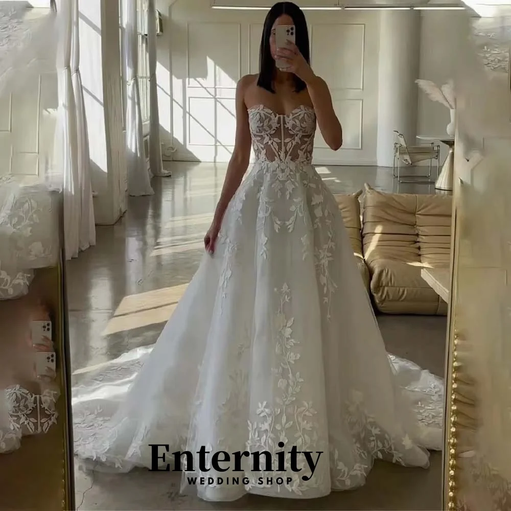 

Customized Sexy Lace Applique Wedding Dress Exquisite Sweetheart Ruffles Bridal Gown Sleeveless Wedding Gown Vestidos De Novia
