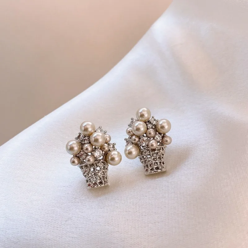 Silver zirconia pearl basket earrings a unique and exclusive design for women, featuring a sophisticated look.