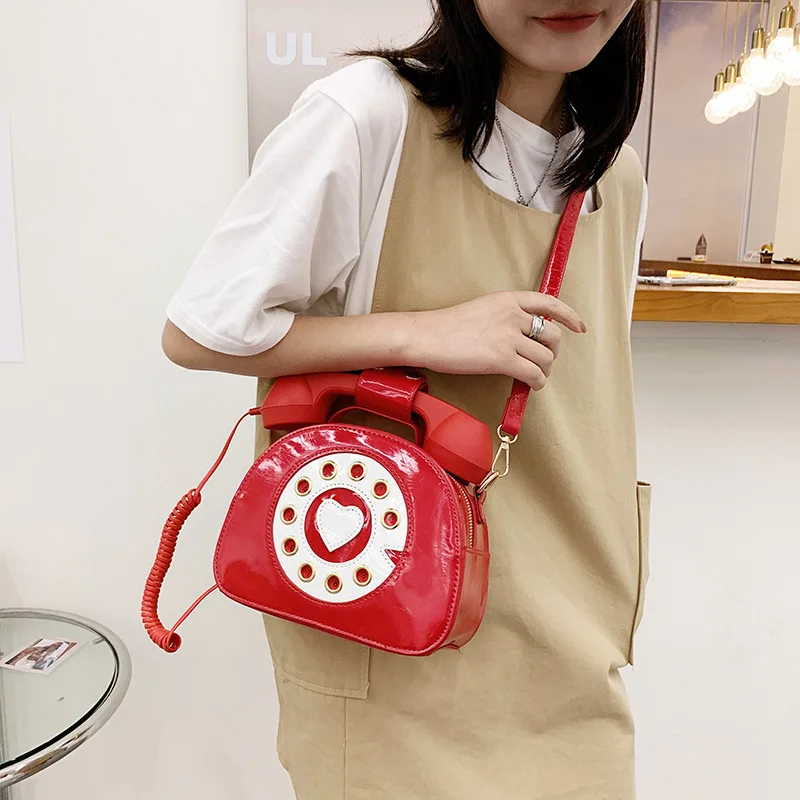 

2025 New Color Personalized Creative Phone Handbag Funny Single Shoulder Lacquer Leather Crossbody Bag luxury designer bags y2k