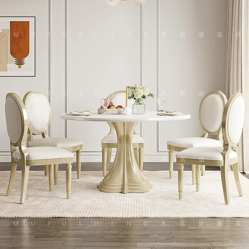 

American light luxury round dining table and chair combination one table and six chairs small apartment high-end French