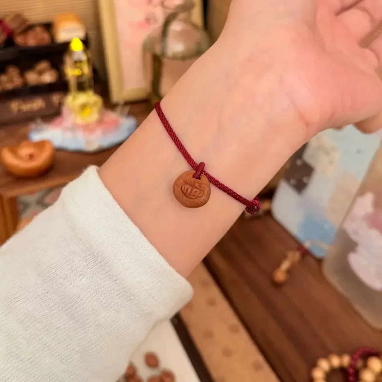 

Handmade Carved Lucky Character "Fu" Natural Peach Kernel Pendant with Wine Red Rope Chain Braided Bracelet for Women Men 1648