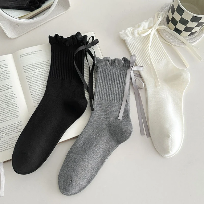 

3 pairs of bow tie women's autumn winter new mid-term sock solid color sweet anti slip sweat absorbing women's socks