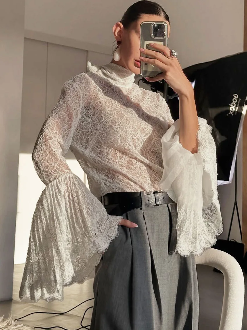 

Elegant See Through Shirt Women Fashion Full Flare Sleeve Sexy Lace Up Loose Solid Shirts Female 2026 Spring Autumn Lady Tops