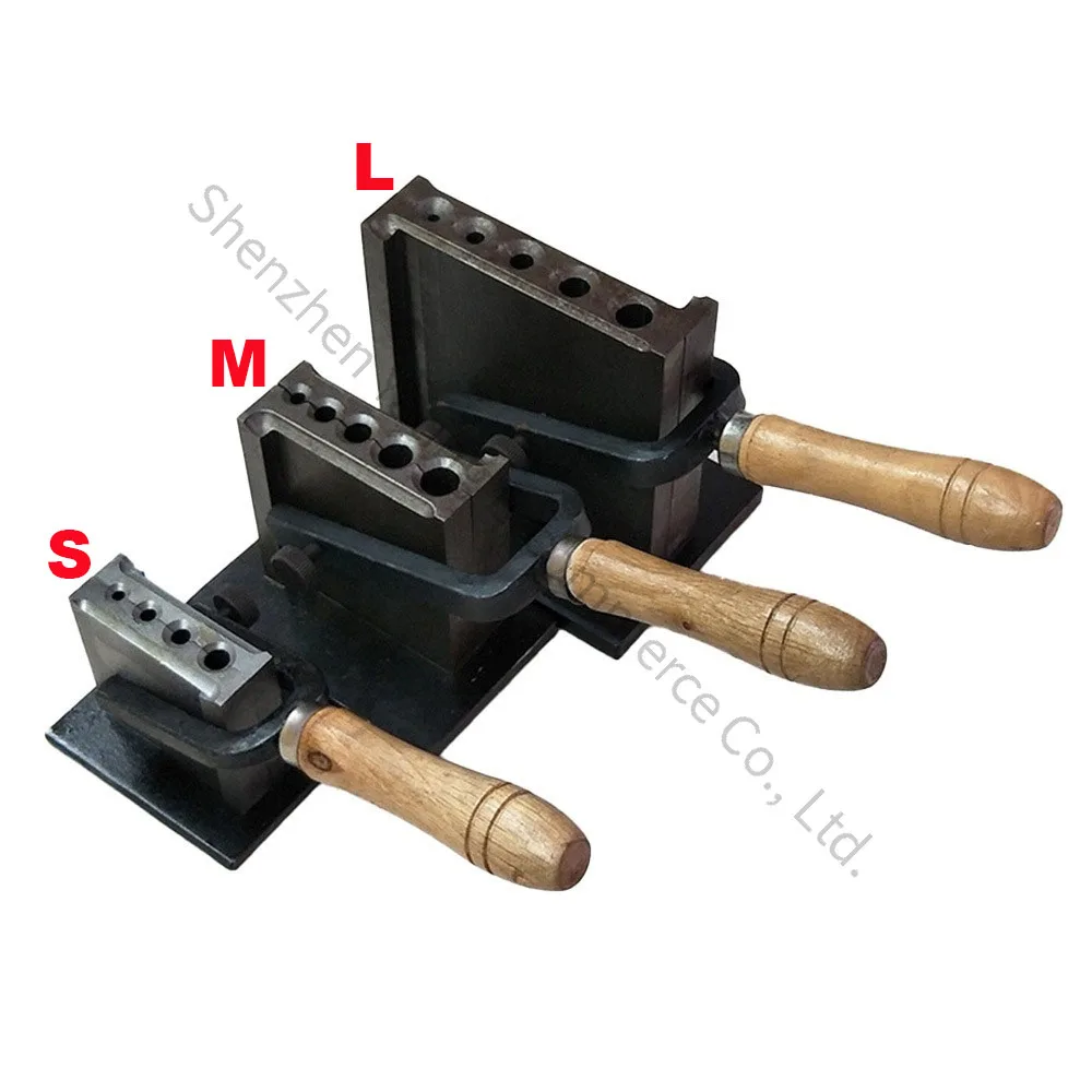Jewelry casting tools: European-style gold and silver casting trough mold with a wooden handle.