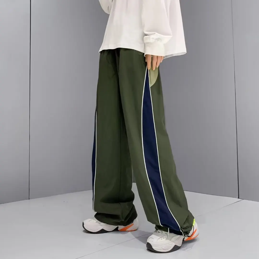 Pantalones deportivos de secado rápido para hombre, ropa de calle activa, pantalones de pierna ancha de tendencia japonesa, pantalones de M-XXXL de gran tamaño empalmados de retazos de verano