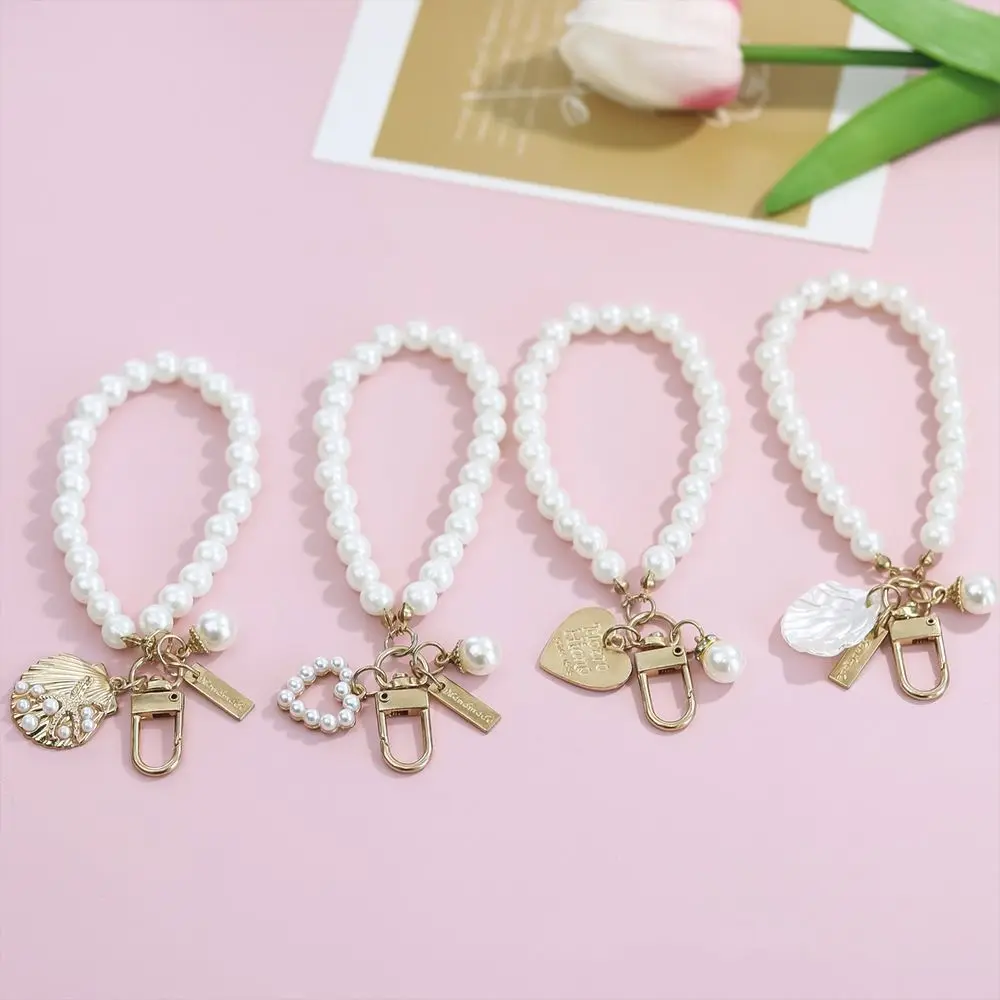 

Universal Pearl Mobile Phone Lanyard Anti-lost Bracelet Chain Cell Phone Strap Shell Flower Phone Wrist Strap Phone Accessories