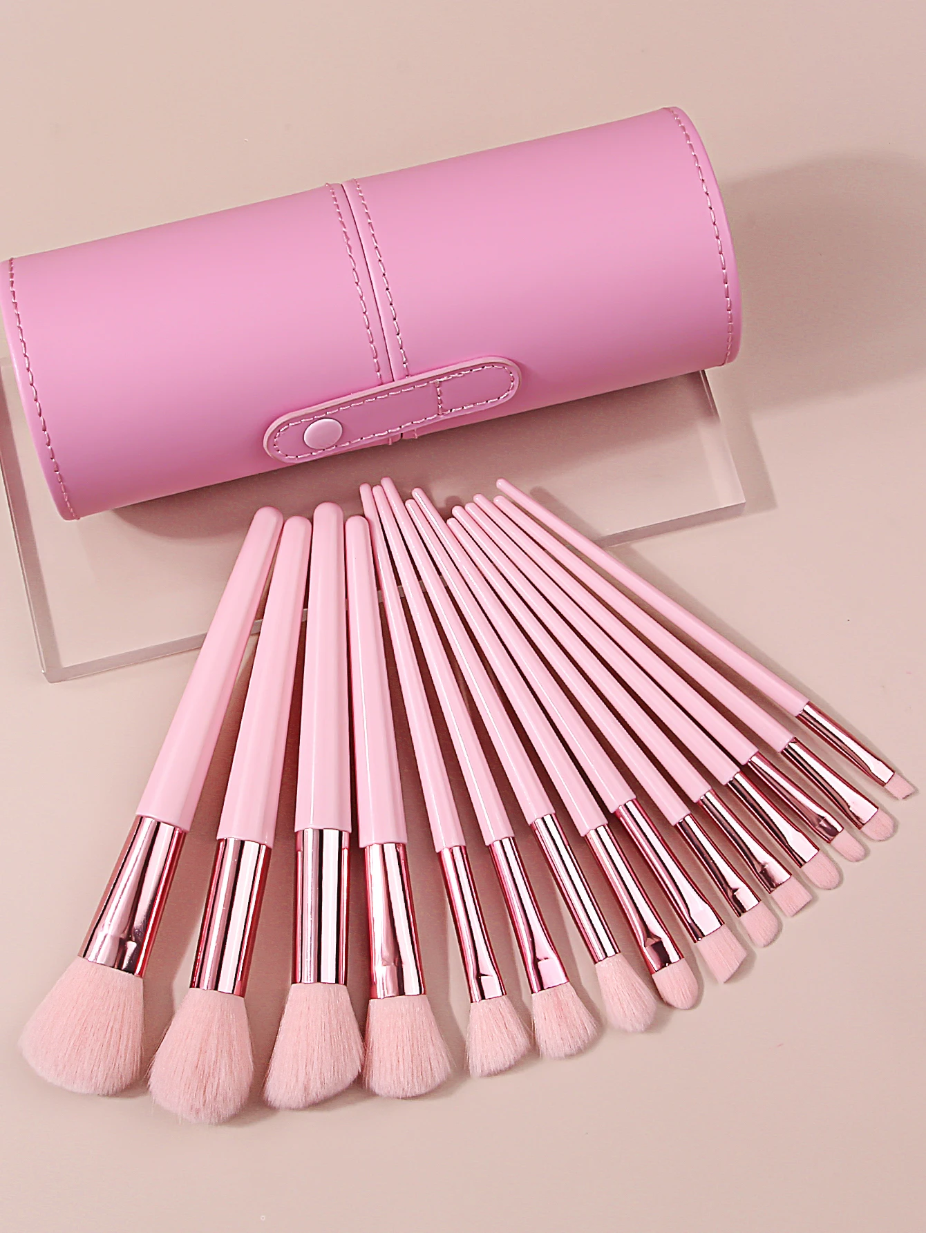 สีชมพู 15 ชิ้นชุดแปรงแต่งหน้าระดับไฮเอนด์นุ่มและปุยชุดแปรงแต่งหน้ามืออาชีพพร้อมถังเก็บกันน้ําสําหรับเดินทาง