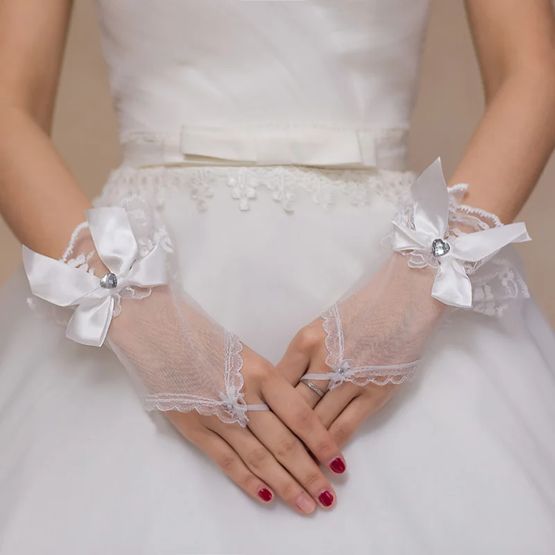 Guantes cortos sin dedos de encaje blanco para boda, guantes de encaje con lazo para novias y damas de honor