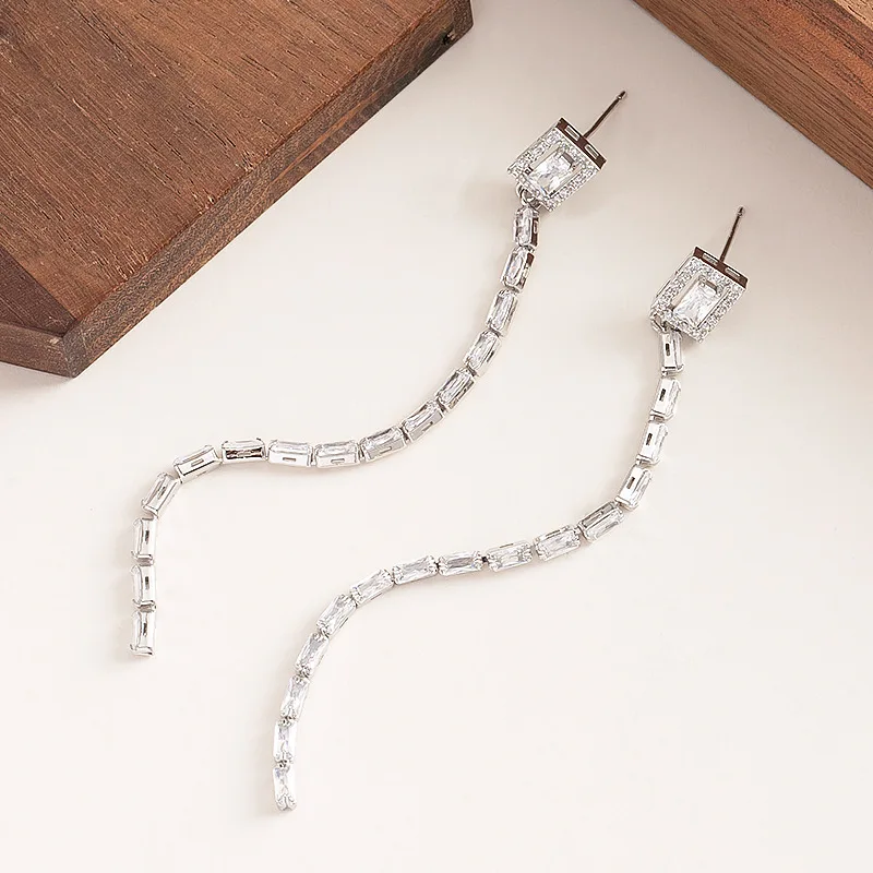 Fashionable and exquisite ultra-shiny zircon long tassel earrings niche light luxury simple high-end commuter earrings