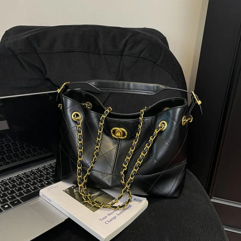 

Leather And Suede Combination Bag For Ladies With Textural Contrast And A High End Designer Look