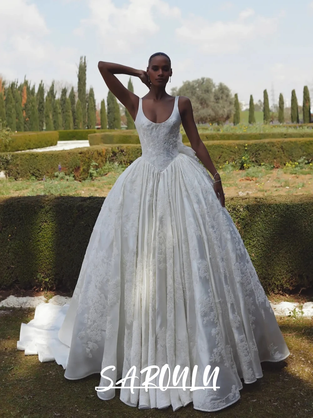 

Princess Scoop Neck Low Back Satin Lace Appliques Ball Gown Wedding Dress With Back Floral Bow and Long Train Bridal Gown