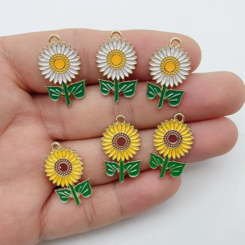 12 piezas de accesorios de aleación con diseño de girasol y efecto de goteo de aceite para la fabricación artesanal de colgantes, pulseras, collares y llaveros