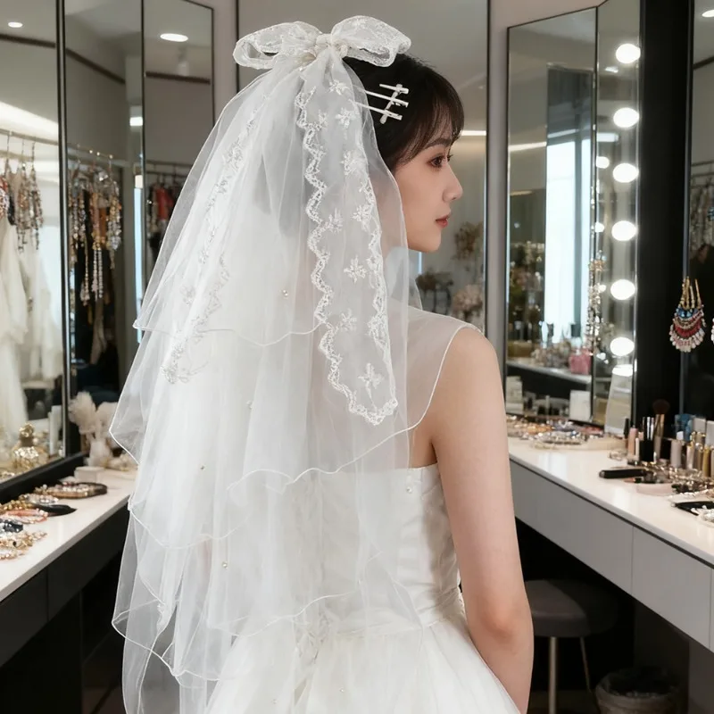 

Double-layered white bridal veil with long trailing ribbon Ethereal European-style party wedding hair accessory for women