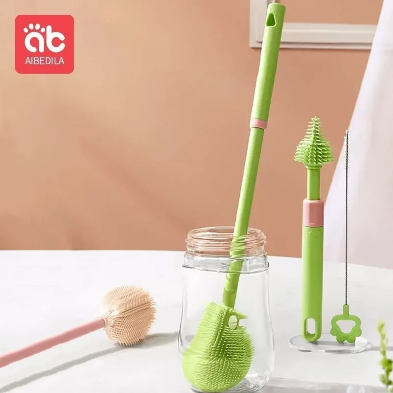 

Щеточка для чистки AIBEDILA, силиконовая щетка для бутылки, вращающаяся на 360 градусов, с длинной ручкой, силиконовая соломинка, щетка для чистки соски, детские инструменты