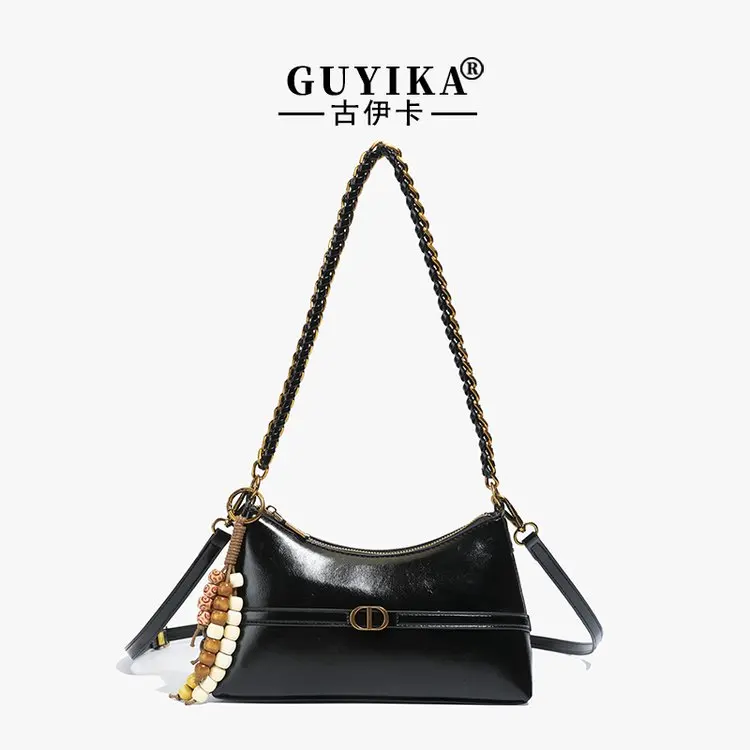 

Simple Yet Fashionable Crossbody-Bag With Unique Textured Leather And Letter Logo Offering Roomy Compartments As A Diaper Bag