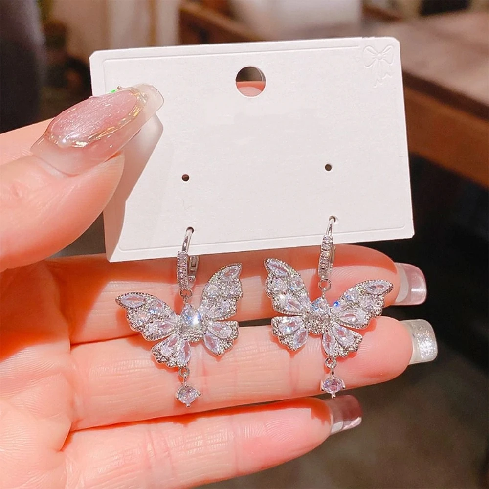 الإبداعية ضوء الفاخرة فراشة كريستال أقراط هوك ثقب الزركون فراشة انخفاض القرط الحلو الأذن مجوهرات اكسسوارات الفتيات