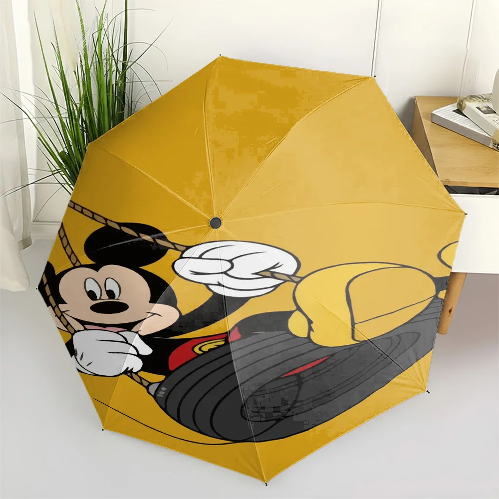 

Disney Mickey Mouse Tire Swing Print Yellow Folding Umbrella, Auto Open/Close Windproof Travel Umbrella for Rain & Sun, Portable