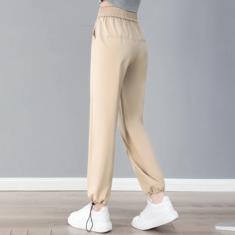 ใหม่สตรีฤดูร้อนผ้าไหมน้ําแข็งบางกางเกงเอวสูงแฟชั่นอเนกประสงค์แห้งเร็วหลวมสบายๆกีฬา 9 จุดกางเกง