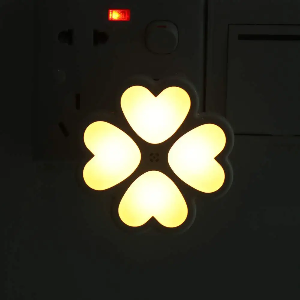 New 4LED intelligent light control nightlight plug-in household bedroom decorative lights baby room lamps.