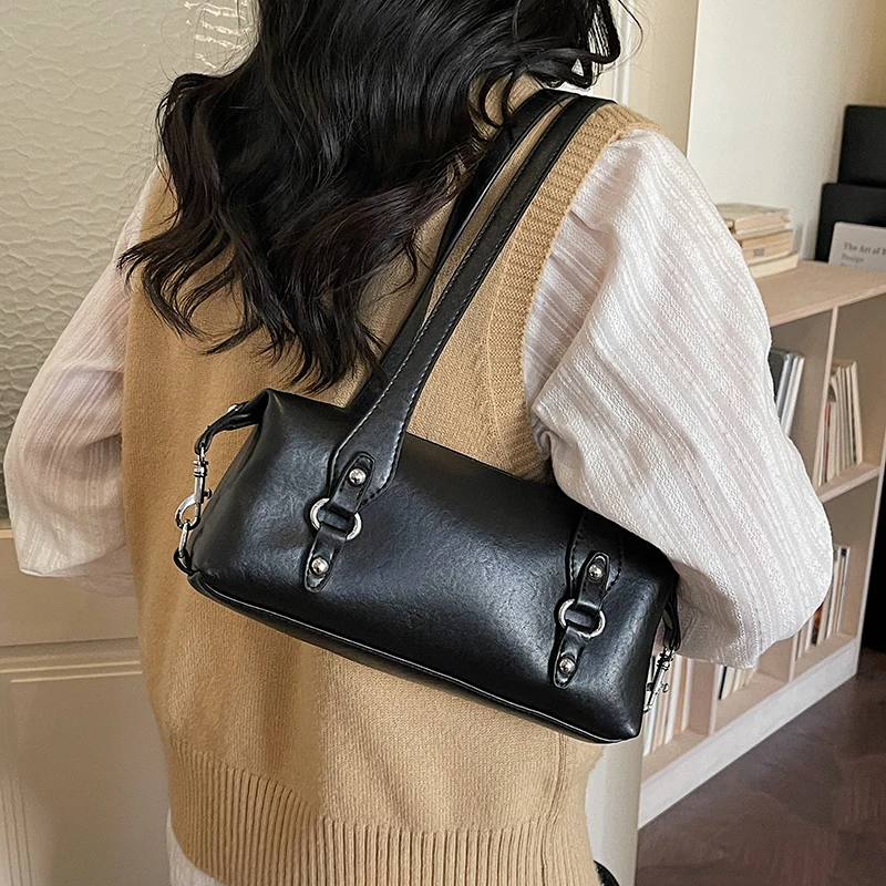 

Women's Leather Cylinder Shoulder Bag Metal Buckle Detail Retro Y2K Minimalist Aesthetic Casual Daily Dating Crossbody Bag 2026